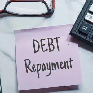 Debt repayment concept depicted in an image - The Greene Law Firm