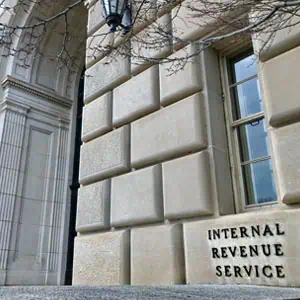 IRS Building Exterior – Learn About Offer in Compromise Eligibility